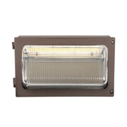 Traditional LED wall pack with glass lens and bronze housing, delivering wide forward light distribution