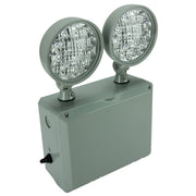 Outdoor-rated LED emergency unit mounted on wall at facility loading dock