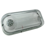 Wet-location LED emergency fixture – angled view showing sealed enclosure and J-box pattern