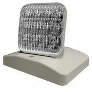 Indoor thermoplastic LED remote head with square prismatic lens on adjustable surface-mount base
