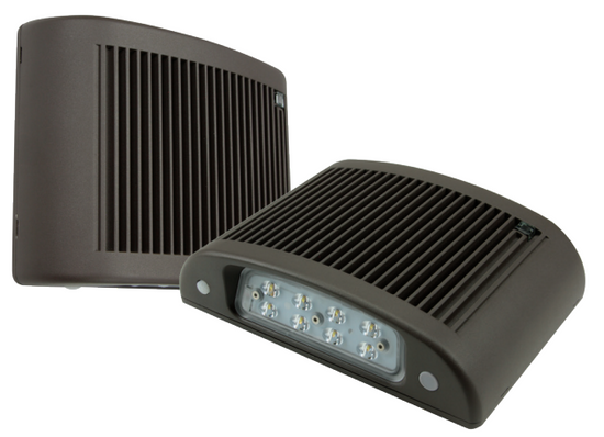 Dual view of slim architectural LED wall packs with bronze ribbed housings and integrated emergency lighting