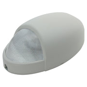 Wall-mounted emergency wallpack with prismatic lens and dusk-to-dawn output - white housing