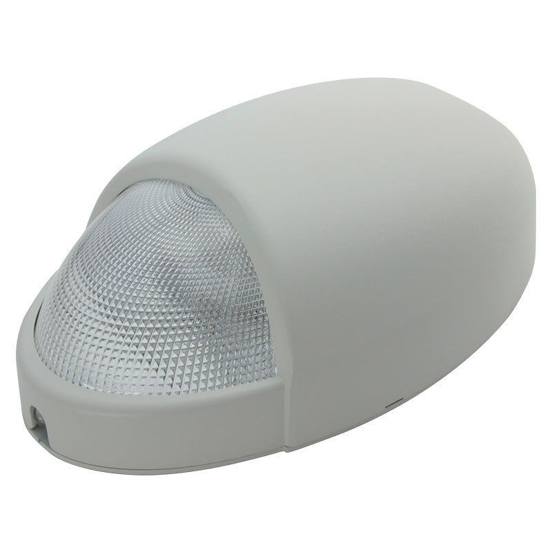 Wall-mounted emergency wallpack with prismatic lens and dusk-to-dawn output - white housing