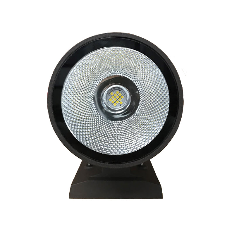 Close-up of LED cylinder wall pack lens with aluminum reflector and COB LED array