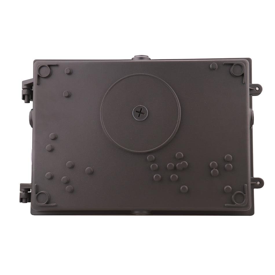Rear view of wall pack fixture showing mounting knockouts and J-box pattern