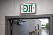 Best Lighting WLEZXTEU compact wet-location LED exit sign installed above commercial doorway