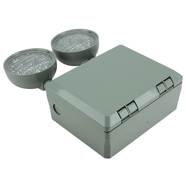 IP-rated LED egress light – side view with gray housing and stainless steel cover hardware